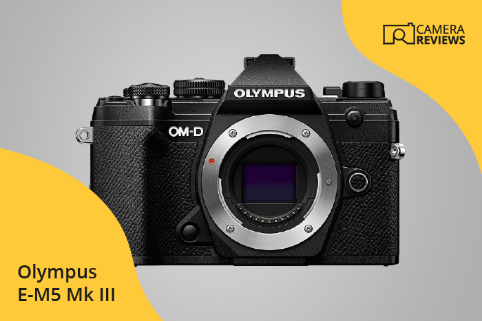Olympus OM-D E-M5 Mark III photographed on a colored background