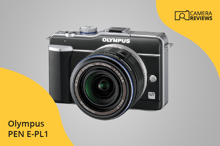 Olympus PEN E-PL1 photographed on a colored background