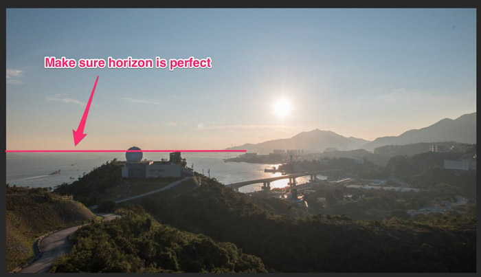 A screenshot showing how to crop a picture in Lightroom with the words "with the words "make sure horizon is perfect"
